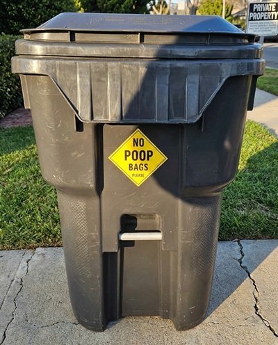 No dog poop bags sticker for trash can
